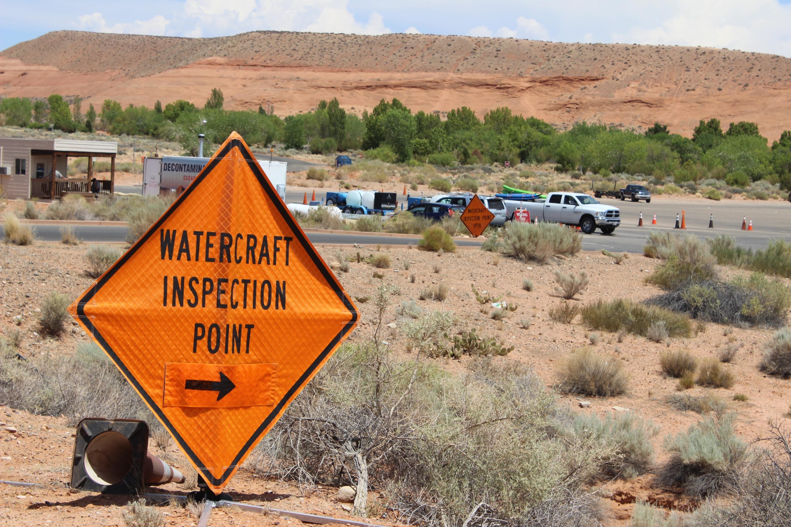 Watercraft Inspection Point. It is unlawful to drive past an open inspection station when carrying watercraft. Courtesy & Copyright Utah Division of Wildlife Resources, Faith Jolley, Photographer