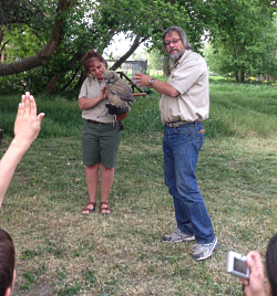 Bryce King and Michelle Groncki with Winston, a Young Great Horned Owl at the Ogden Nature Center, May 16, 2018 Courtesy & © Lyle Bingham, Photographer