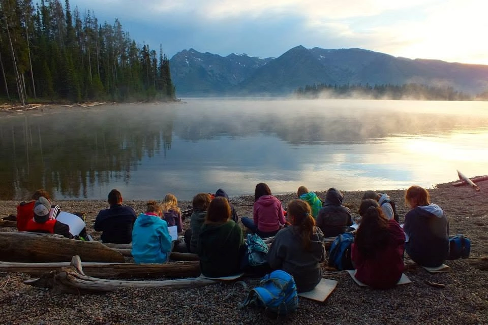 Click for a larger view in a new tab or window Writers at work. Jackson Lake sunset Grand Teton National Park Courtesy & Copyright Eric Newell, Photographer